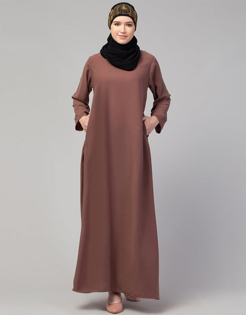 Trendy Abaya made from Nida fabric with a flared hem for a feminine touch In Color Light brown